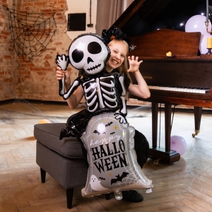 Fóliový balónek Kostra na halloweenském náhrobku 58x120,5cm
